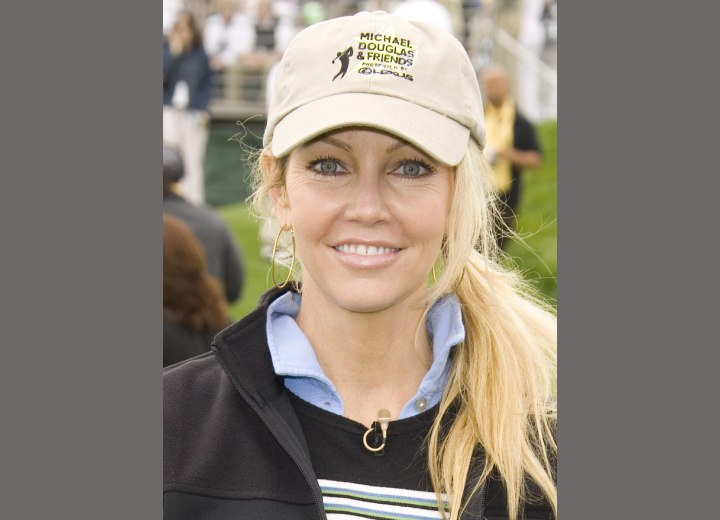 Heather Locklear wearing a polo shirt with the collar up
