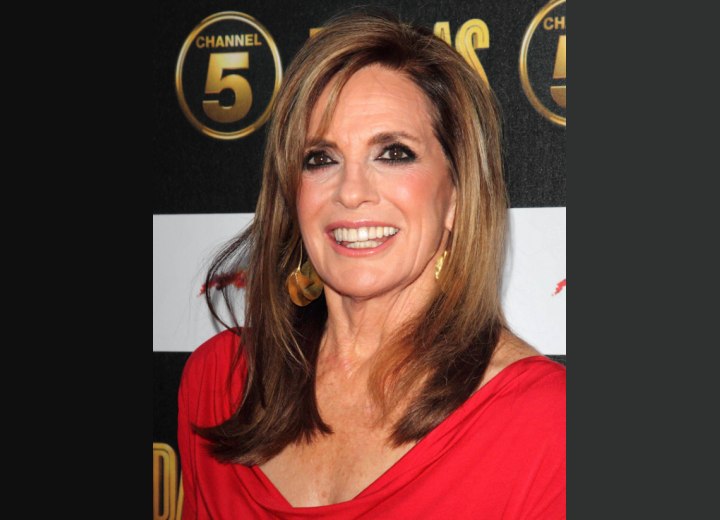 Linda Gray - Long hairstyle with highlighting for a youthful appearance