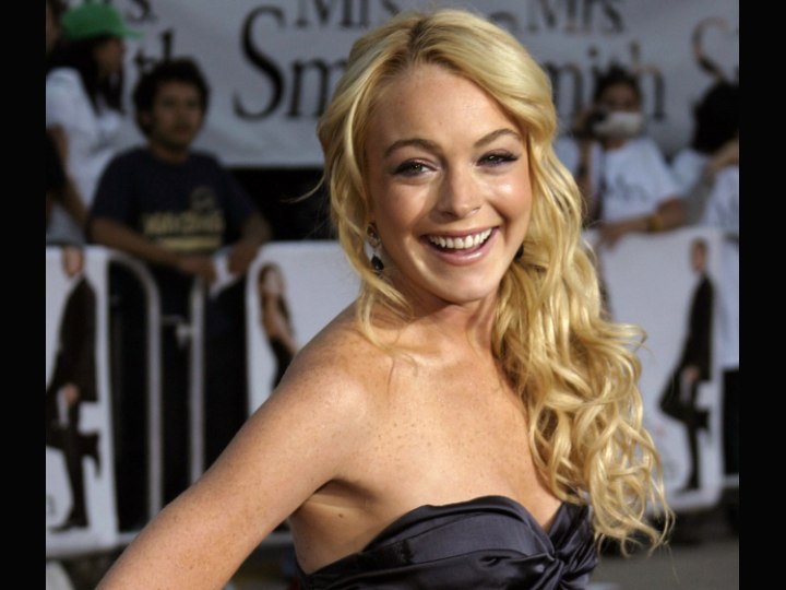 Lindsay Lohan with blonde below the shoulders hair
