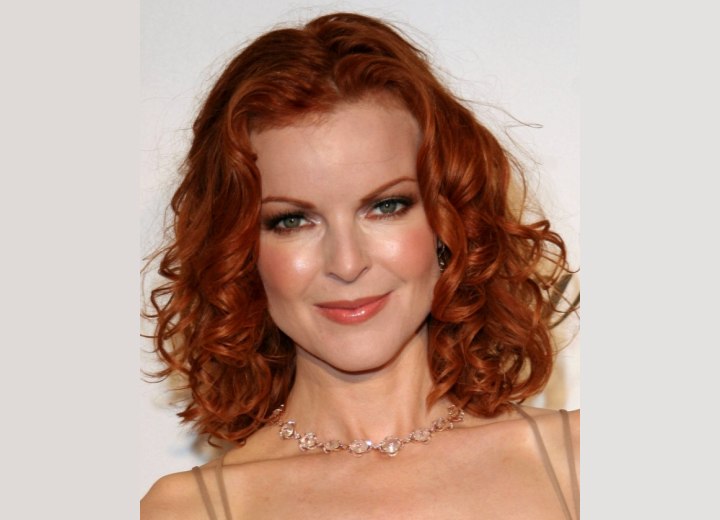 Marcia Cross with her hair in curls