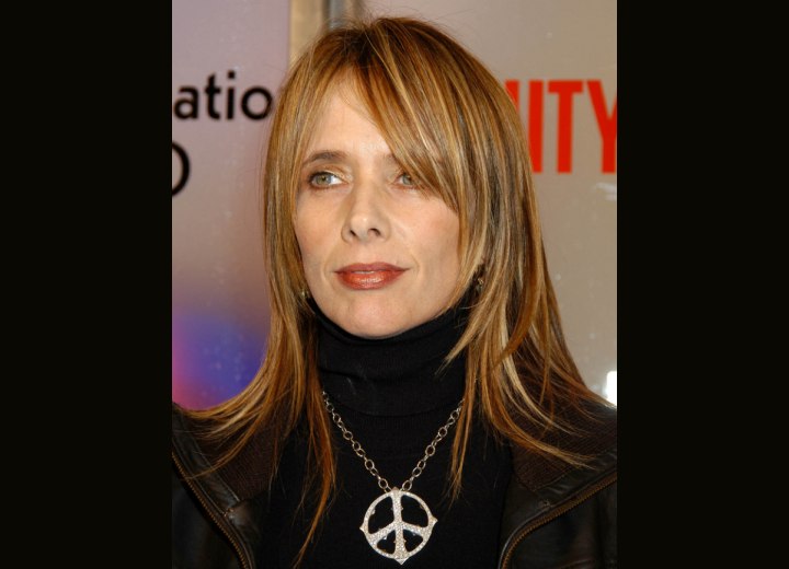 Rosanna Arquette's long tapered hairstyle and turtleneck