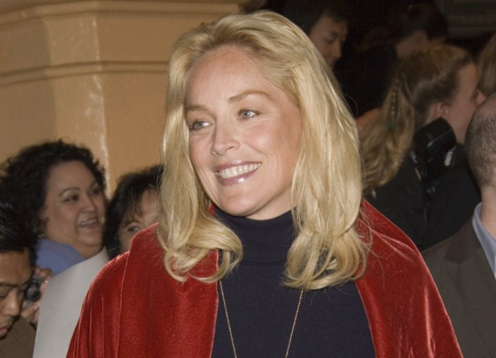 Sharon Stone sporting long curly hair