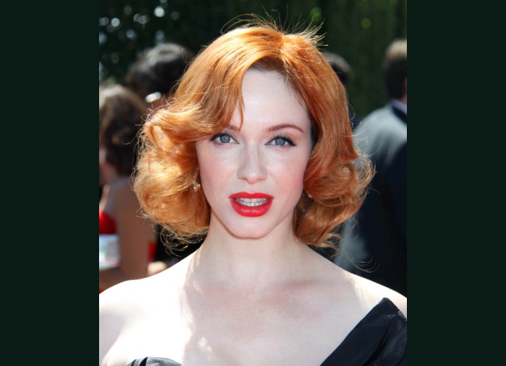 1950s hairstyle for red hair with waves - Christina Hendricks