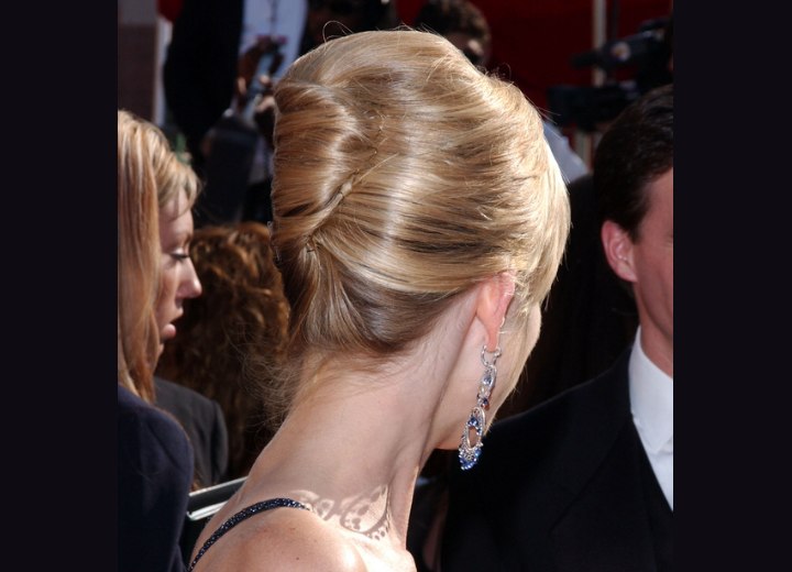 Back view of an updo with a banana roll - Courtney Thorne-Smith