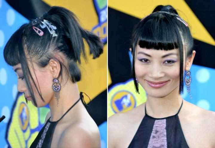 Bai Ling wearing her black hair in a high ponytail
