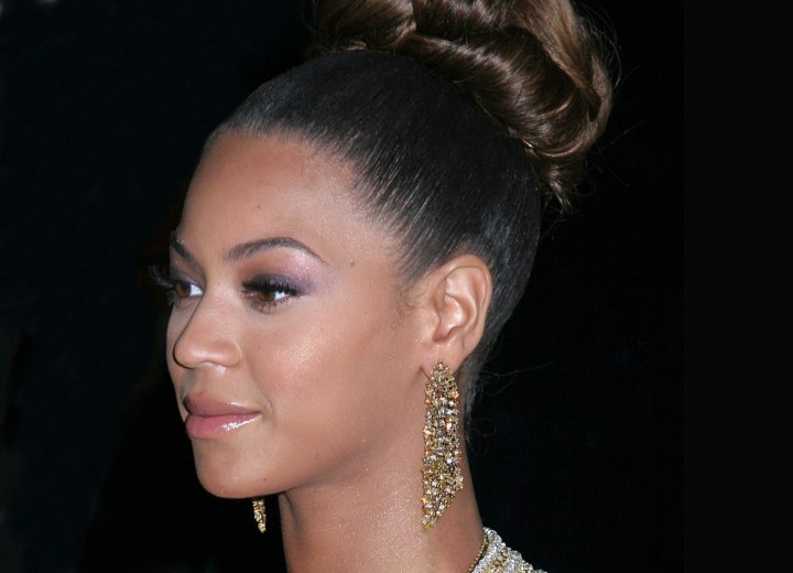 Beyonce's up-style with a cluster of curls