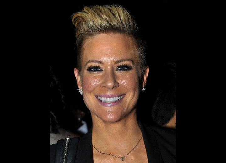 Brittany Daniel with very short clipper cut hair