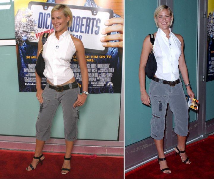 Brittany Daniel wearing a white halter blouse