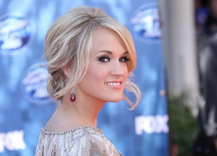 Side view of Carrie Underwood's loose up-style