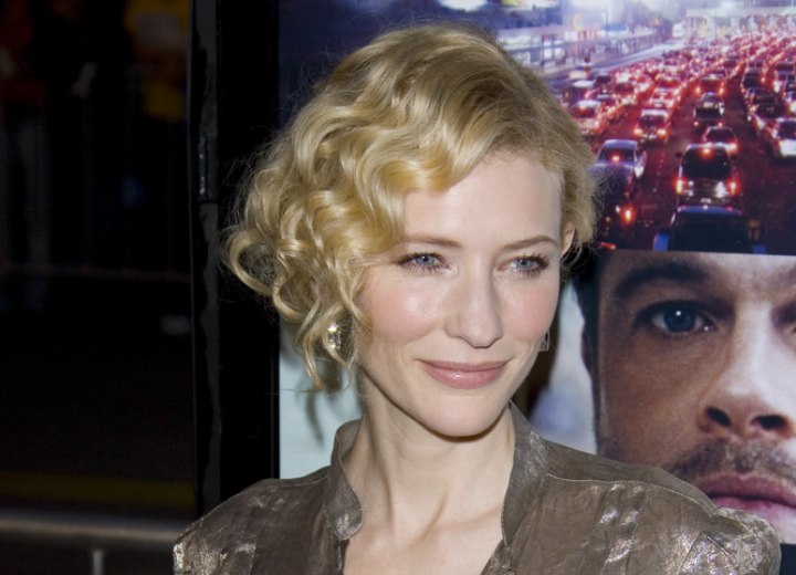 Cate Blanchett's hair styled up with curls along the side of her face