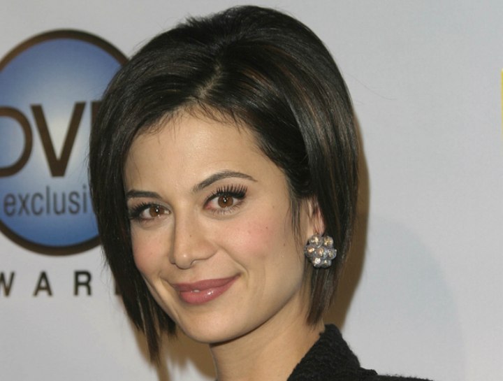 Catherine Bell wearing her hair in a bob with lift at the scalp