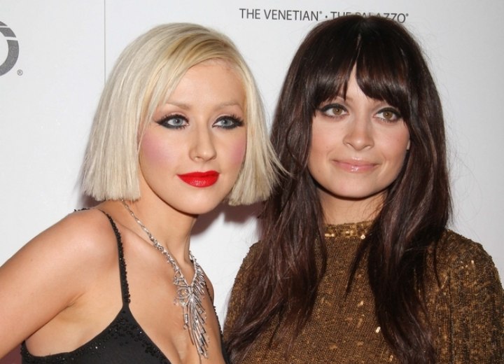 Christina Aguilera with short hair and Nicole Richie with long hair
