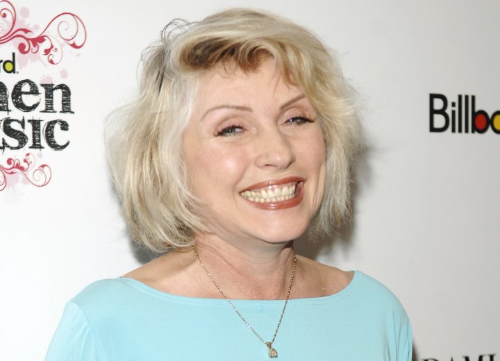 Modern bob hairstyle for a woman aged over 60 - Debbie Harry