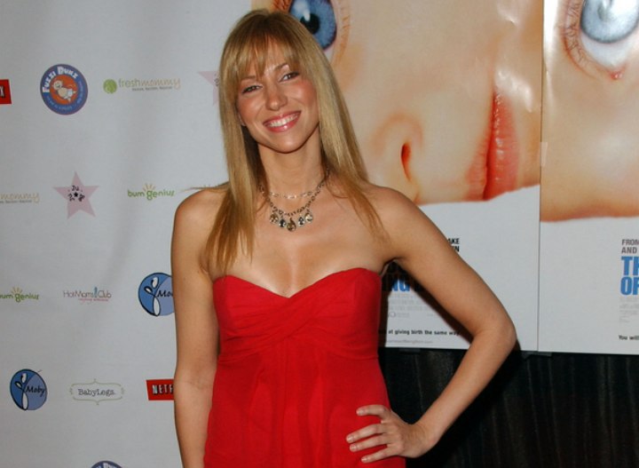 Deborah Gibson wearing a strapless red dress