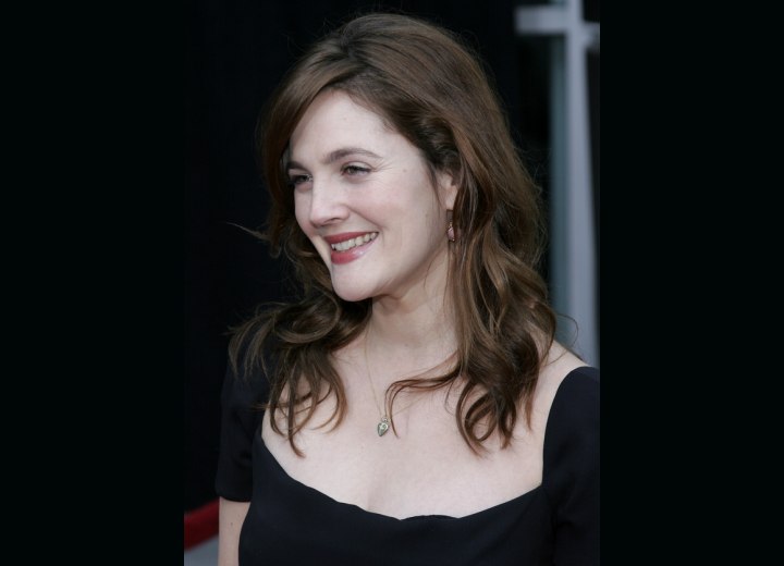 Side view of Drew Barrymore's long layered hairstyle