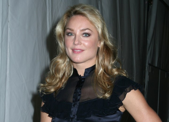 Elisabeth Rohm with a silk blouse and wearing her hair down