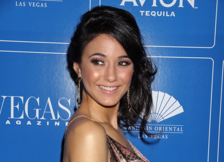 Emmanuelle Chriqui wearing her hair in a semi-updo with curls