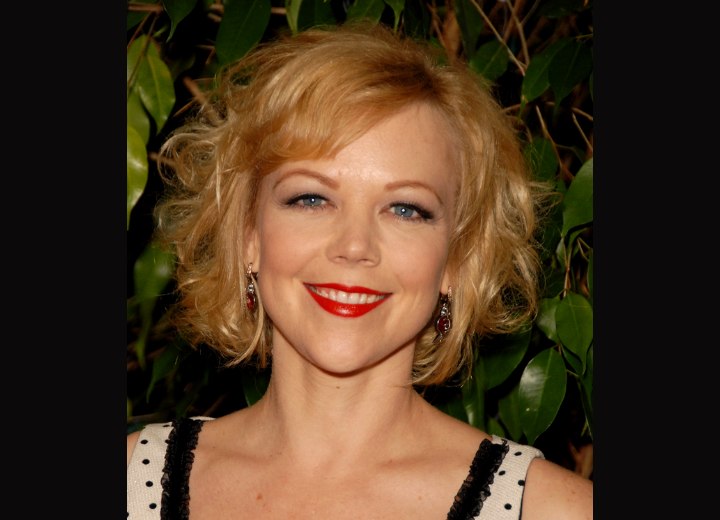Emily Bergl - Midway upon the neck hairstyle with curls