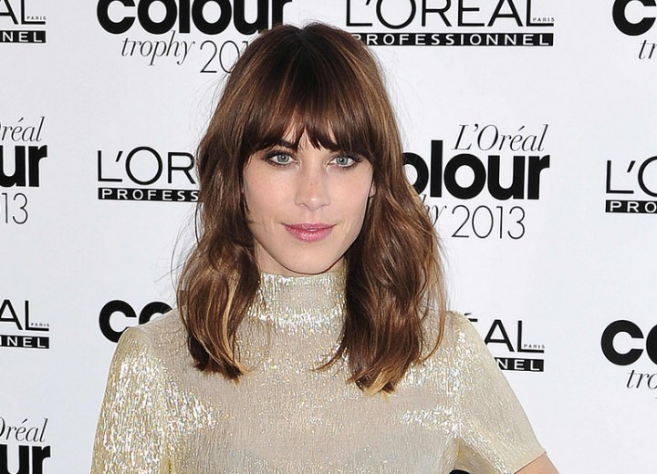 Alexa Chung with bangs that fall right at the eye