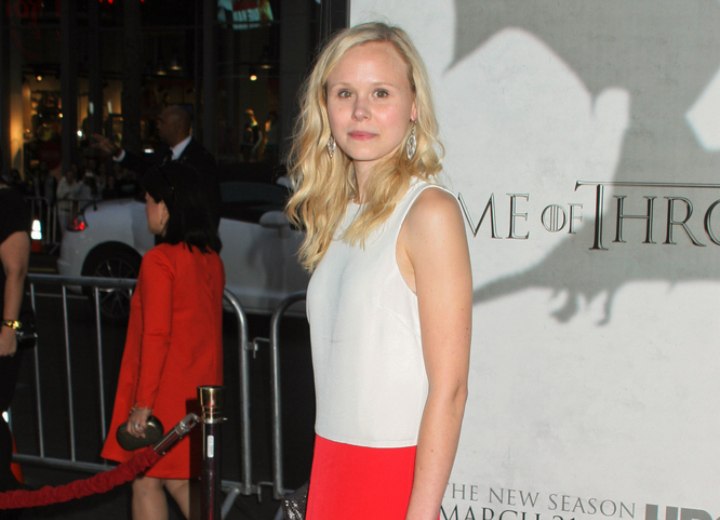 Alison Pill wearing a red and white color blocked outfit