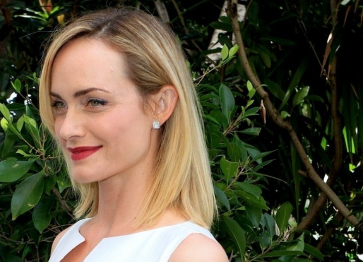 Side view of Amber Valletta's simple sleek hairstyle