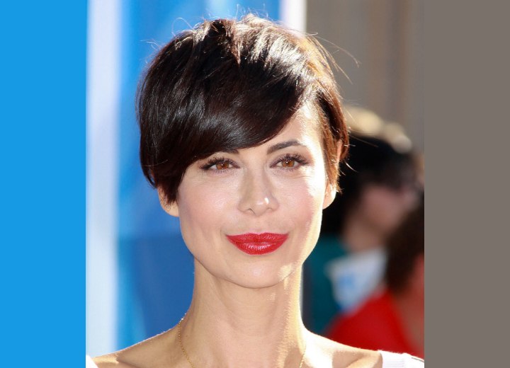 Catherine Bell's short pixie hairstyle with side bangs