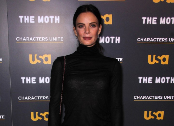 Gabrielle Anwar wearing a black scrunch turtleneck