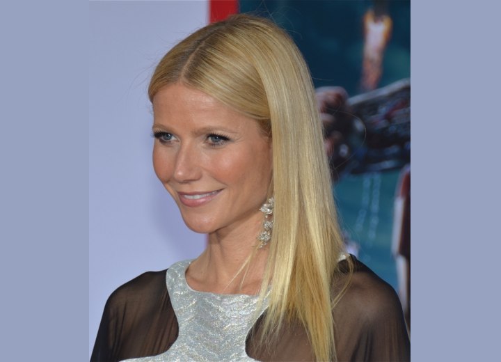 Gwyneth Paltrow with her long hair pulled to one side