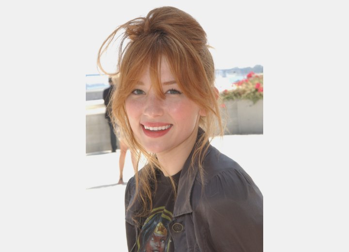 Haley Bennett wearing her red hair in an updo