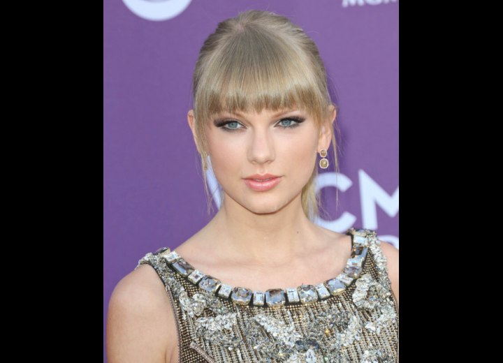 Taylor Swift's hair with rounded bangs to frame her face