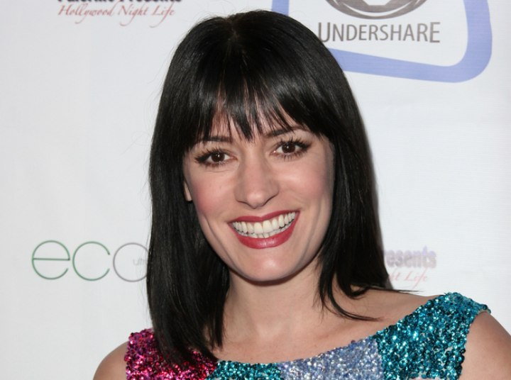 Straight shoulder length hairstyle - Paget Brewster