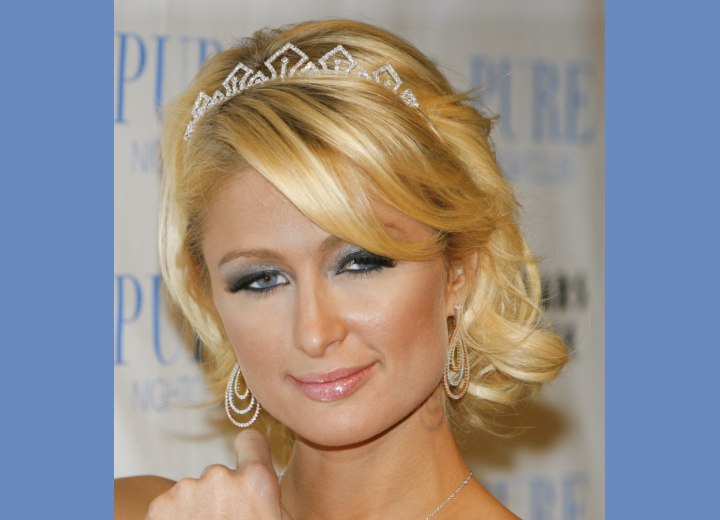 Paris Hilton wearing a tiara in her hair