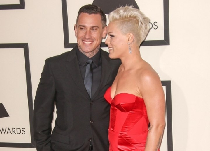 Pink - Hair in a Mohawk and a red dress