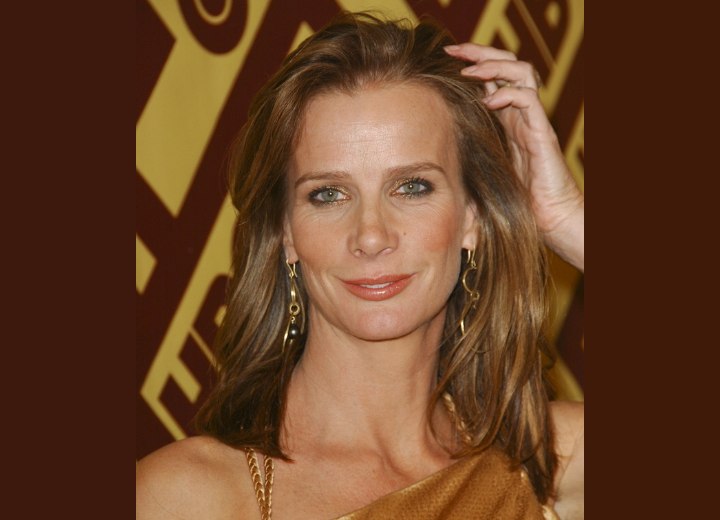 Long face reavealing hairstyle - Rachel Griffiths