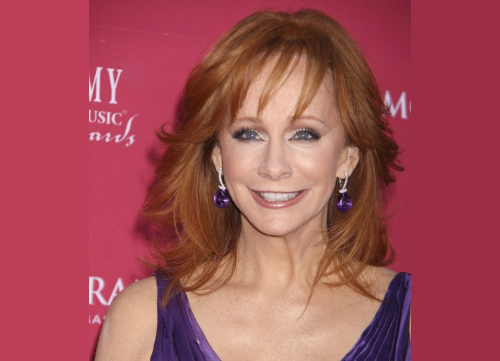 Reba McEntire - Long layered hairstyle with feathering