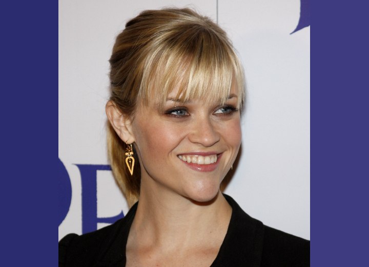 Bangs cut at the eyebrows - Reese Witherspoon