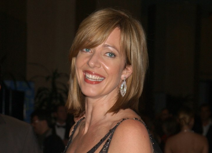 Hair with layers to make it thicker and fuller - Allison Janney