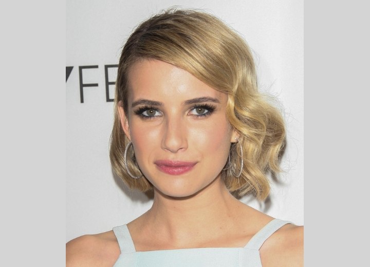 Emma Roberts wearing her hair in a medium length vintage style