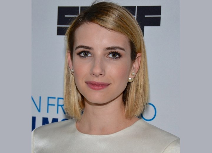 Emma Roberts with her hair cut in a bob with rounded layers