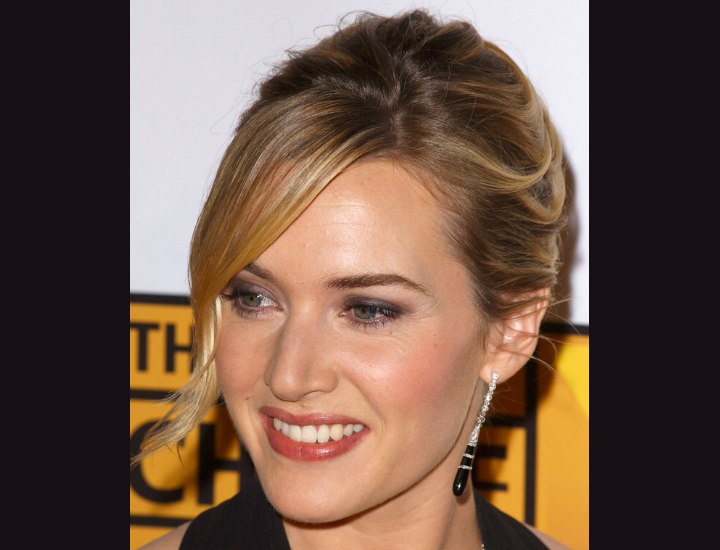 Kate Winslet's hair in an updo with a French twist