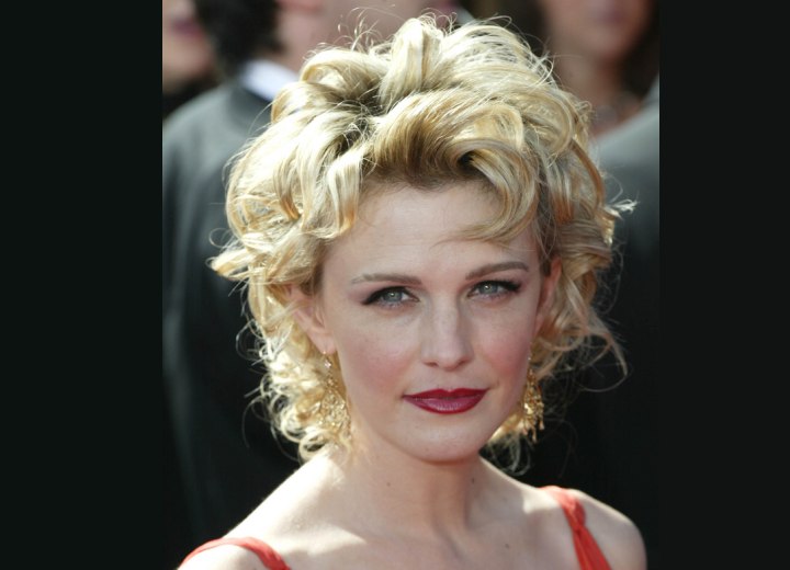 Kathryn Morris with short curly hair