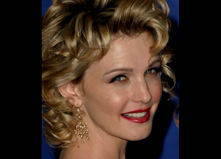 Close up photo of Kathryn Morris curls
