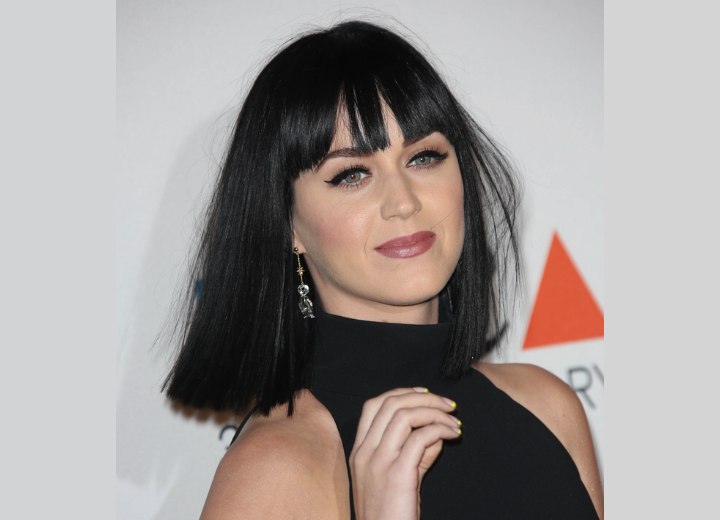 Katy Perry with black shoulder length hair