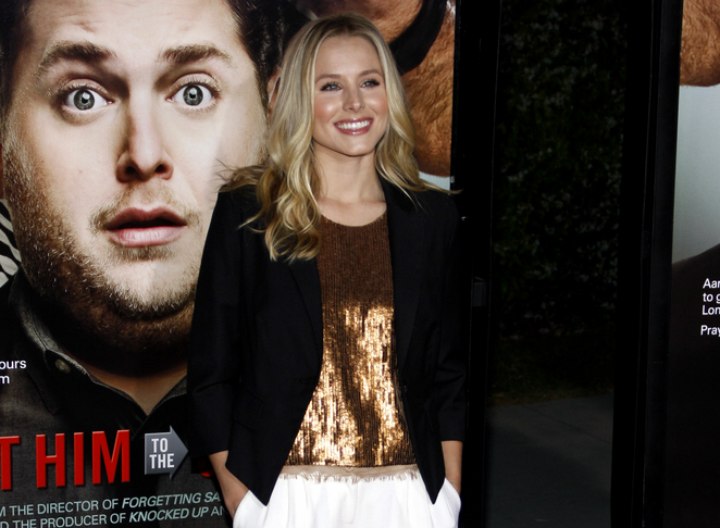 Kristen Bell's look with a shiny brown top and blazer