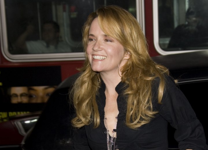 Lea Thompson's casual look with jeans and a shirt