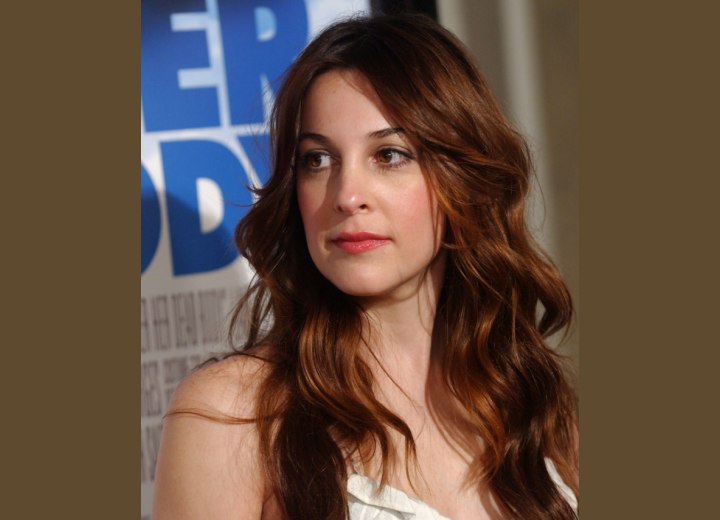 Lindsay Sloane's long curly hairstyle