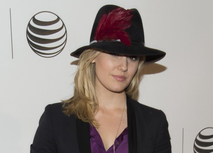 Maggie Grace's fun and fresh look with a hat