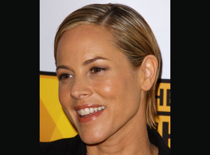 Maria Bello's side parted short hairstyle