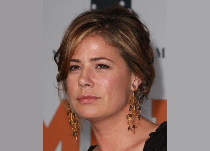 Maura Tierney wearing her hair in an updo