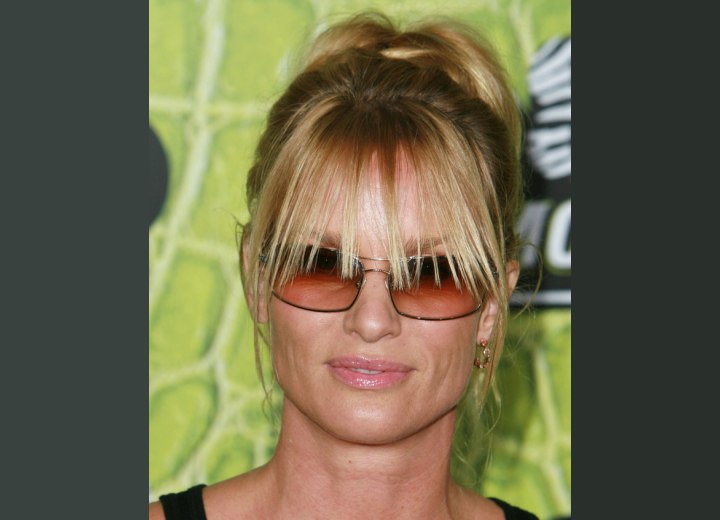 Nicollette Sheridan's hair with long piecy bangs